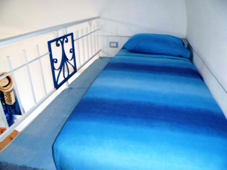 Single bed on mezzanine